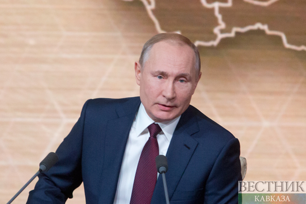 "Всевидящий" портрет Путина уехал в Россию  